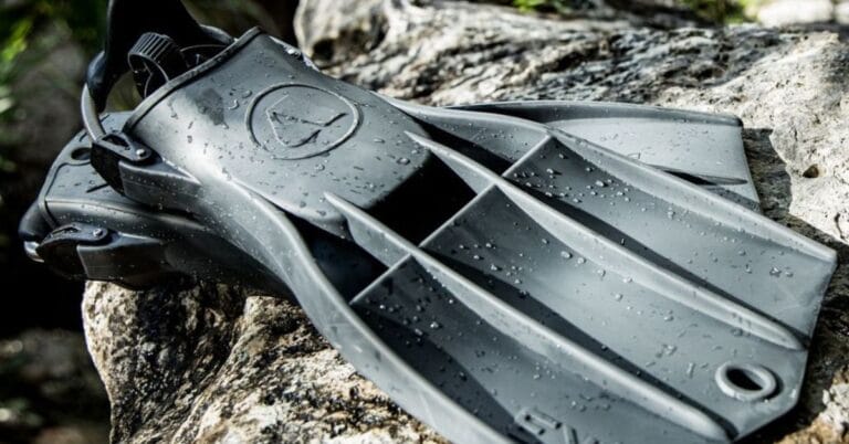 Close up of the Apeks RK3 fins placed on top of a rock