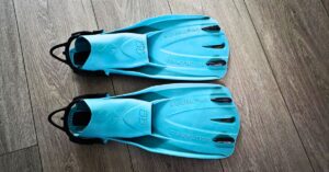 Pair of SCUBAPRO GO Sport fins side by side with visible wear from years of use. For article titled SCUBAPRO GO Sport Review