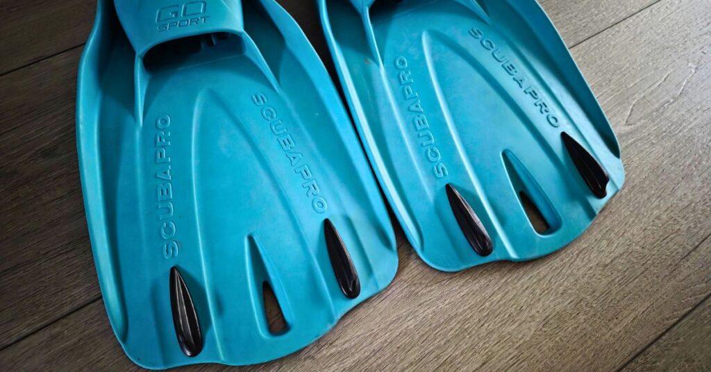 Close up of the blade tips of SCUBAPRO GO Sport fins side by side with visible wear from years of use. For article titled SCUBAPRO GO Sport Review