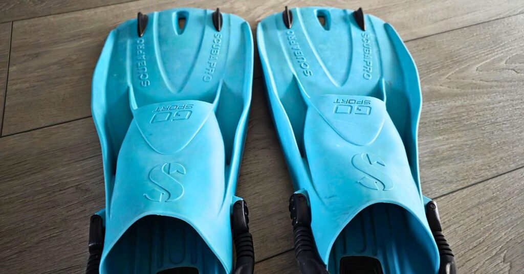Close up of the top of the foot pockets of SCUBAPRO GO Sport fins side by side with visible wear from years of use. For article titled SCUBAPRO GO Sport Review