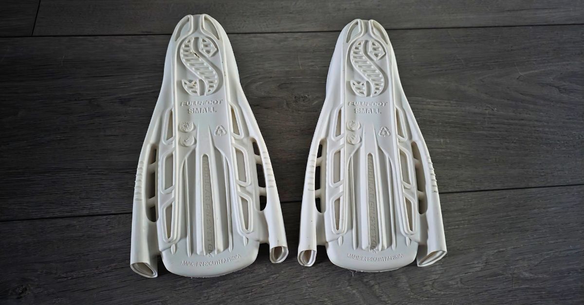 Bottoms of SCUBAPRO Modular Fin System Full Foot Pockets showing wear from a handful of dives. For an article titled SCUBAPRO Modular Fin System Full Foot Pocket Review
