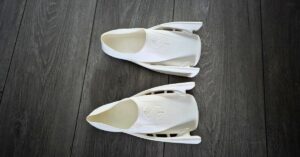 SCUBAPRO Modular Fin System Full Foot Pockets side by side showing showing wear from a handful of dives. For an article titled SCUBAPRO Modular Fin System Full Foot Pocket Review