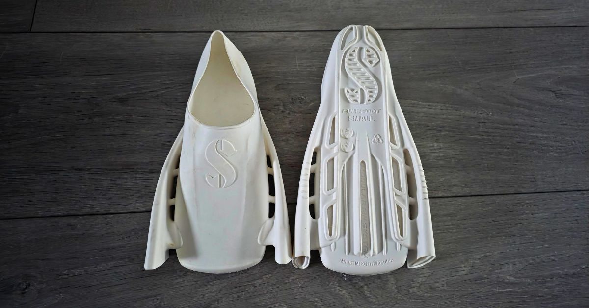 Top and bottom of SCUBAPRO Modular Fin System Full Foot Pockets showing wear from a handful of dives. For an article titled SCUBAPRO Modular Fin System Full Foot Pocket Review