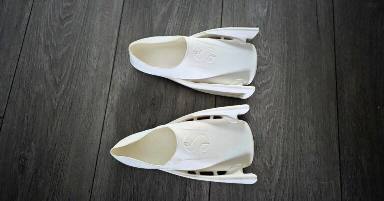 SCUBAPRO Modular Fin System Full Foot Pockets side by side showing showing wear from a handful of dives. For an article titled SCUBAPRO Modular Fin System Full Foot Pocket Review