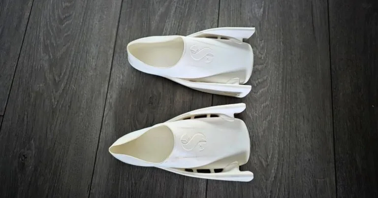 SCUBAPRO Modular Fin System Full Foot Pockets side by side showing showing wear from a handful of dives. For an article titled SCUBAPRO Modular Fin System Full Foot Pocket Review