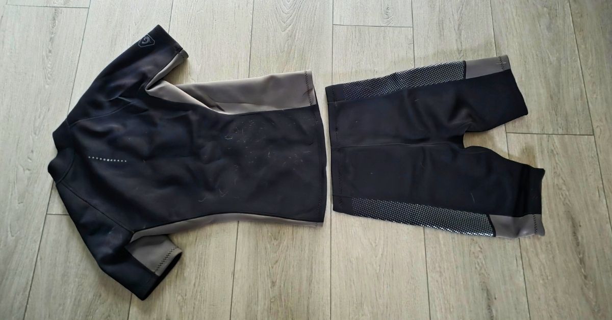 Rear of GoldFin 2mm wetsuit top & wetsuit shorts showing wear from use. For article titled GoldFin 2mm Wetsuit Top & Wetsuit Shorts Review.