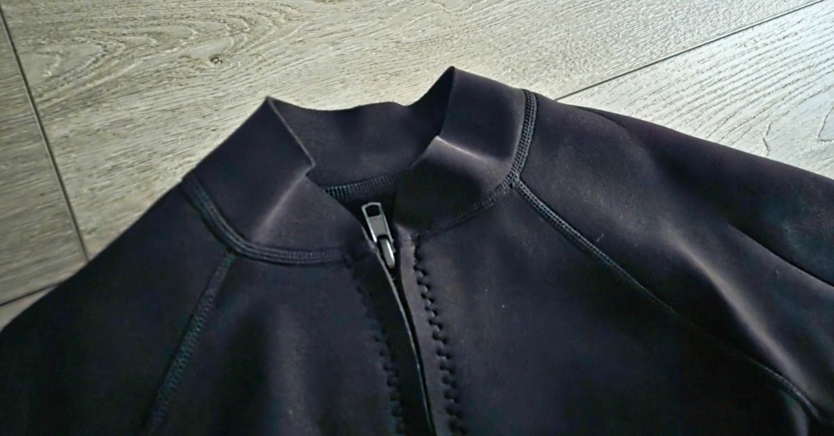Close up of GoldFin 2mm wetsuit top neck seal showing wear from use. For article titled GoldFin 2mm Wetsuit Top & Wetsuit Shorts Review.