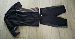 Front of GoldFin 2mm wetsuit top & wetsuit shorts showing wear from use. For article titled GoldFin 2mm Wetsuit Top & Wetsuit Shorts Review.