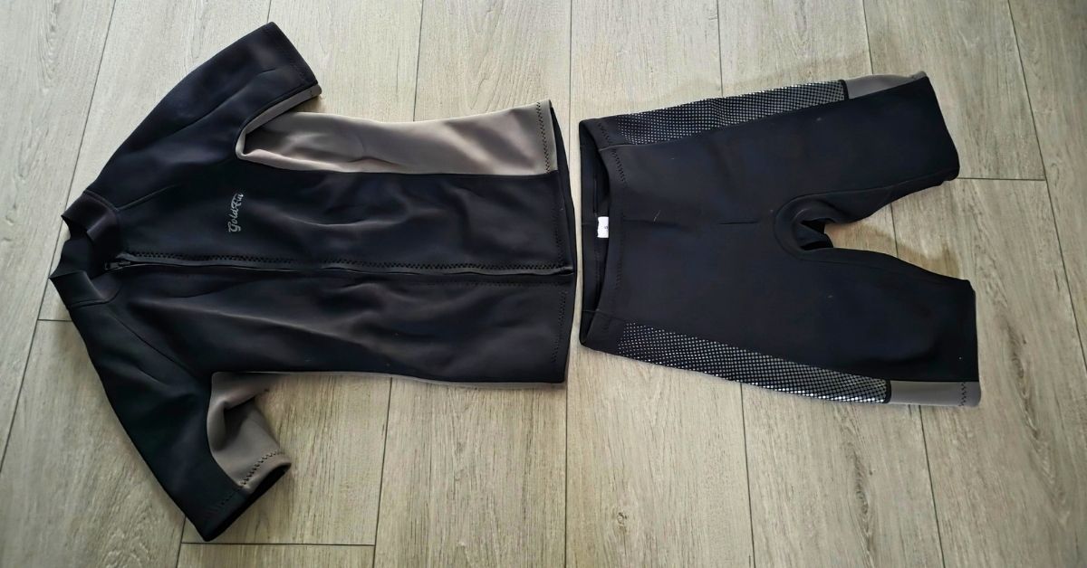 Front of GoldFin 2mm wetsuit top & wetsuit shorts showing wear from use. For article titled GoldFin 2mm Wetsuit Top & Wetsuit Shorts Review.