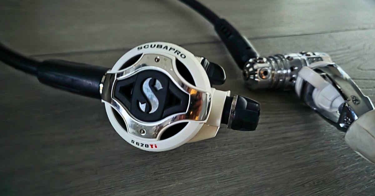 Close up of SCUBAPRO MK25 EVO/S620 Ti logo showing wear from years of use. For article titled SCUBAPRO MK25 EVO/S620 Ti Review.